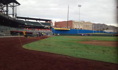 Runners near home plate. The finish line for the El Paso Marathon was inside the ballpark.