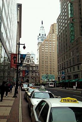 The statue of William Penn rising over City Hall in Philadelphia.