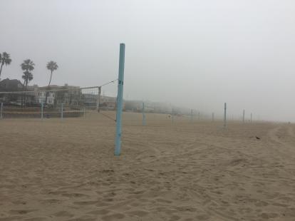 Fog rolling over the volleyball courts at Manhattan Beach 
