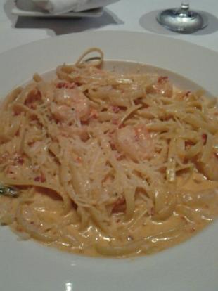Caron pasta at Garufas. Fettucinne with shrimp, sun dried tomatoes, and rich cream sauce. 