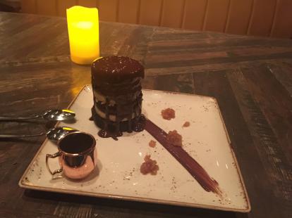 OpenNote: Chocolate layer cake at Stonewood. Liquid chocolate poured on top of the ice cre