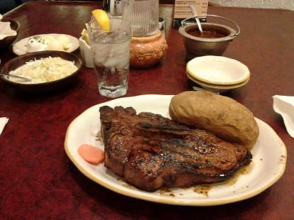 T-bone steak.1.5 pounds at Cattleman's. Lots of sides. #food. Well cooked at medium. M