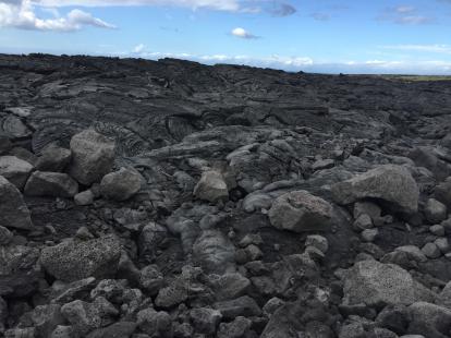 Kekaha Kai Beach park. All lava rock on a rough road which would be best traversed with a 