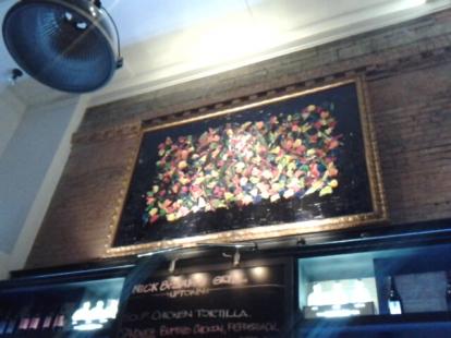 Nick and Sam's Grill. A colorful painting above the bar. Dallas.