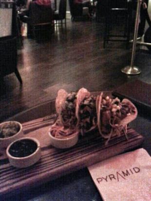 Three pork carnitas at the Pyramid inside the Fairmont Hotel. Well cooked. Served with gua