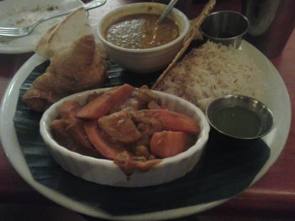 Buddha's delight at cosmic cafe. A good samosa, basmati rice, and curried vegetables. 