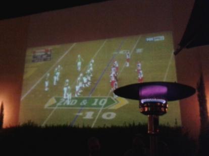  Big  screen projection at the outside  patio at corner tavern
