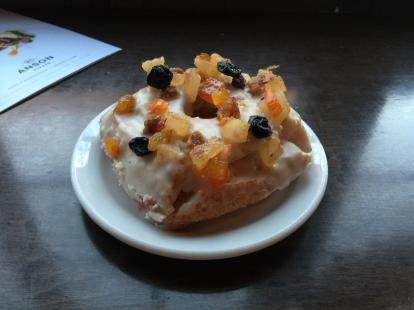 Fruit cake donut at Hillside Coffee #food #elpaso. Real fruitcake pieces on top, creative.