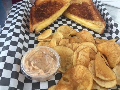 Grilled cheese sandwich with chips at Oceans 13 $7 2018. Fries are better. #food