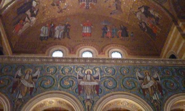 The murals to the right upon entering the Cathedral Basilica of Saint Louis. Joseph Cardin