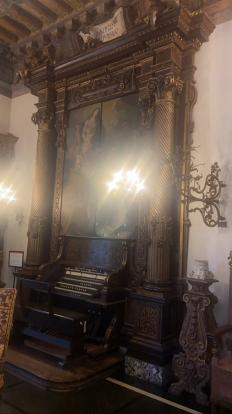 Vizcaya house painting split in half to cover pipes of piano organ