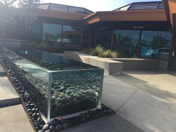 Re/max estate properties real estate agency with acrylic water fountain Manhattan Beach