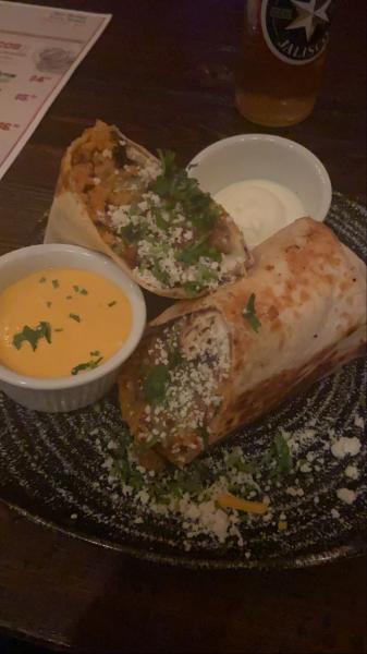 El Santo Taqueria one pound burrito with carne Asad’s #food 2022 Miami
