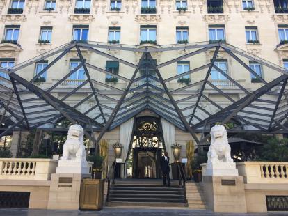 The entrance to the Peninsula Paris Hotel. Old meets new in architecture.