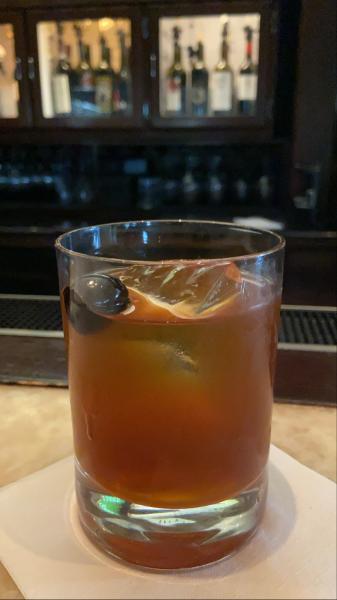 Trulackâ€™s Fig Manhattan - rye, vermouth, fig syrup, orange butter. $9 during happy 