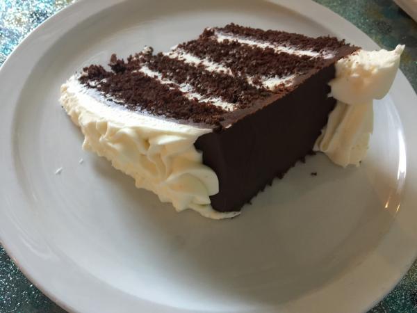 Chocolate cake at Indulgence Bakery and Cafe Italian Cream Cake #food $5.50