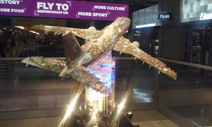 From New York ... To the World by Charles Fazzino at JFK Airport. Commissioned by American