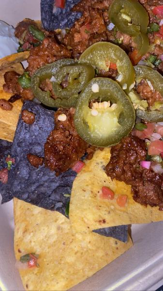 Silverspot Cinema loaded nachos with impossible meat $18 #food 2022
