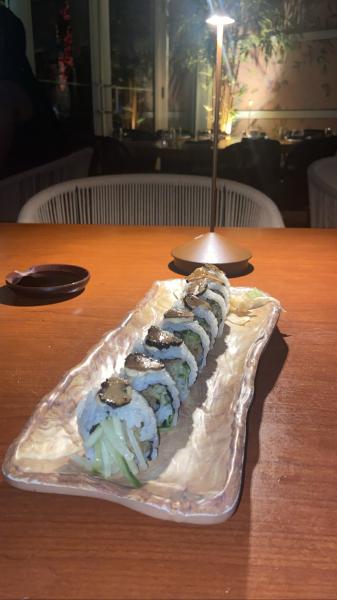 Komodo roll with mushroom on the inside and truffles on the top #food 2022