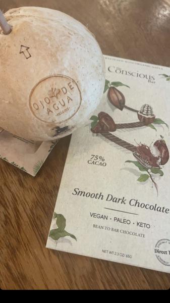 Ojo de Agua Coconut thai fresh juice $10 Conscious Bar 75 percent cacao dark chocolate bar