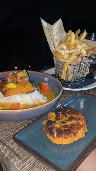 CMX Brickell #food inside the movie theater French fries, artichoke cake, and butternut sq