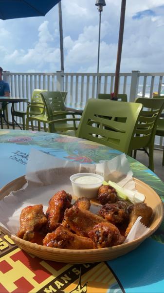 Jimmy Johnson’s Big Chill patio seating by the water Key Largo Florida 2022 Thai chili w