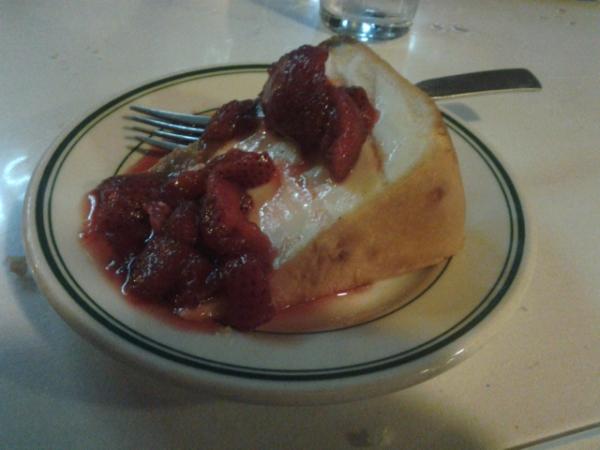  cheesecake  with strawberries at Wall Street Bar and Grill in Odessa #food.  large slice,
