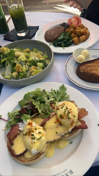 Balan’s eggs Benedict with bacon and plant based breakfast plate. Cesar salad. #food exc