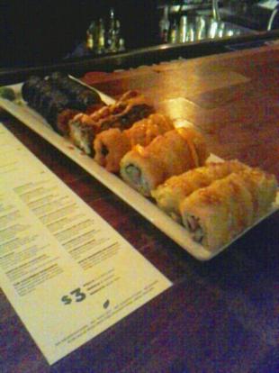 $3  sushi on  Wednesdays at  the  Garden #food. a large amount of  sushi.  the picture onl