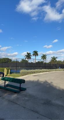 Two public tennis courts in Miami Beach on the golf course