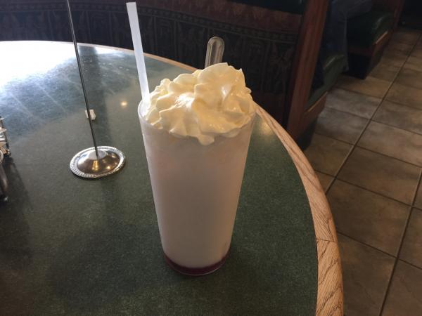 Italian soda at International Delights Cafe in Las Cruces. Cherry Almond with half and hal